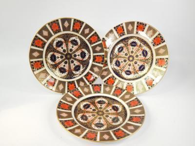 A set of twelve Royal Crown Derby porcelain dinner plates