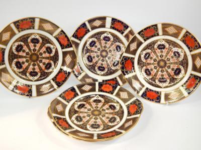 A set of five Royal Crown Derby porcelain bread plates