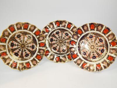 A set of five Royal Crown Derby porcelain dessert plates