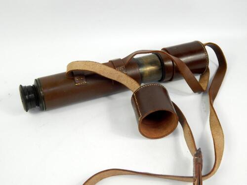 A brass and leather three draw telescope, Hillary-Everest 25x-40x, 29cm long.