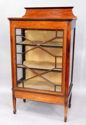 An Edwardian mahogany and marquetry display cabinet