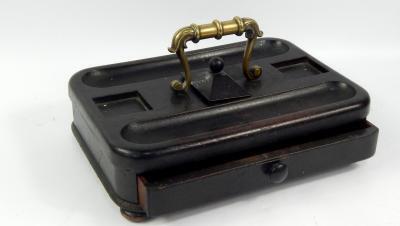 A Victorian ebonised desk stand