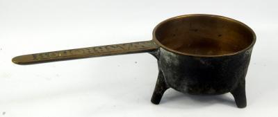 An antique iron and brass posnet