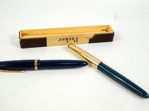 A Parker blue duofold fountain pen