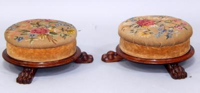 A pair of Victorian rosewood foot stools