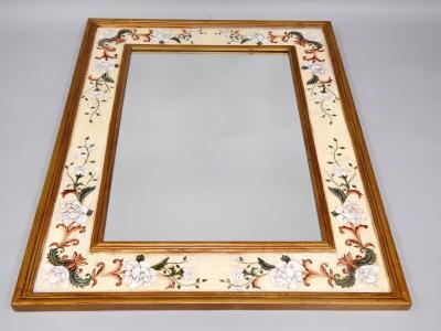 A modern gilt rectangular wall mirror