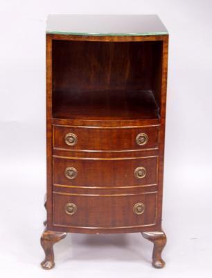A reproduction mahogany bow fronted bedside cabinet
