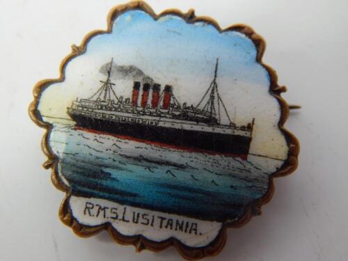 A brass and enamel souvenir badge for the RMS Lusitania.