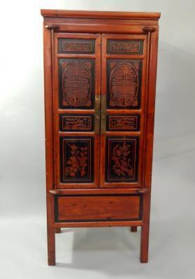 A Chinese stained softwood and lacquer wardrobe