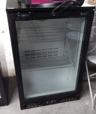 A LEC black undercounter drinks refrigerator.