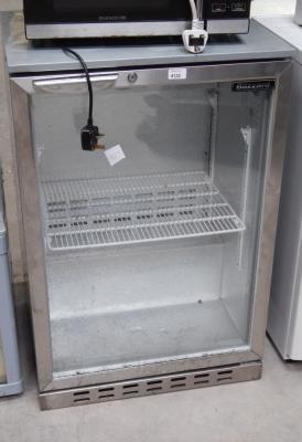 A Blizzard silver finished undercounter fridge.