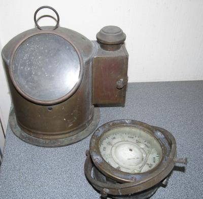 A nautical brass binnacle