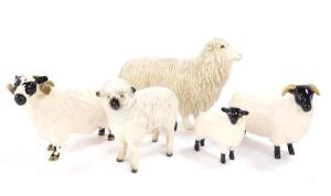 Five Beswick pottery figures modelled as sheep.