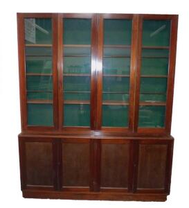 A mahogany cupboard bookcase