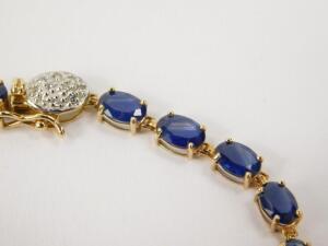 A 9ct gold and sapphire tennis bracelet - 2