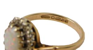 A 9ct gold and oval opal ring - 2
