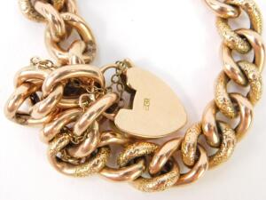 A curb link bracelet on a heart shaped padlock clasp - 2