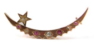 A Victorian crescent moon and star brooch