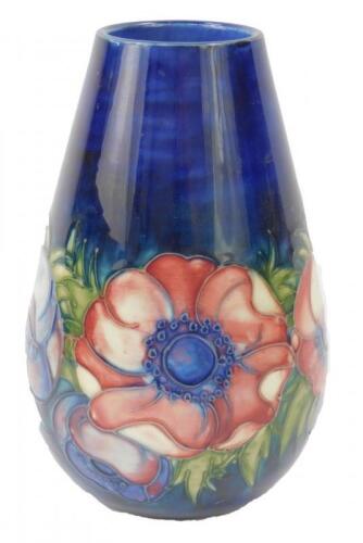 A Moorcroft pottery vase decorated in the Anemone pattern