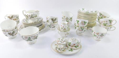A Wedgwood porcelain part tea service decorated in the Wild Strawberry pattern