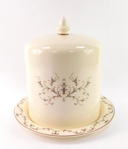 A Wedgwood Queen's ware cheese bell and stand