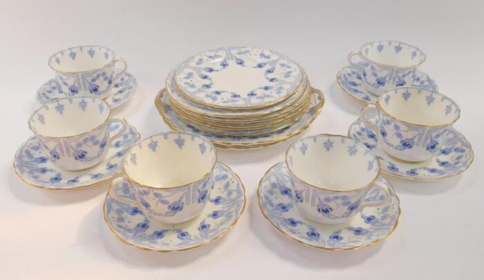 A Royal Doulton porcelain part tea service decorated in the Fuschia pattern