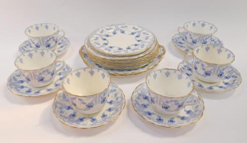 A Royal Doulton porcelain part tea service decorated in the Fuschia pattern