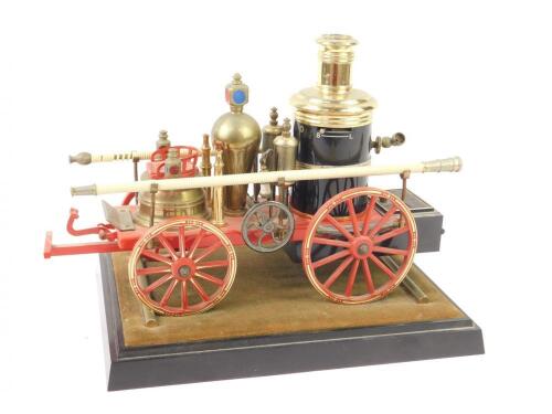 A novelty table lighter modelled as an 1869 Steam Fire Engine