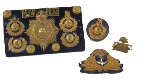 A Royal Marine's cap badge and buttons