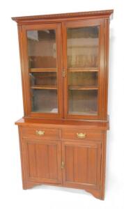 A Victorian mahogany cupboard bookcase