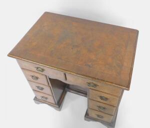 A George II walnut and mahogany cross banded kneehole desk - 2