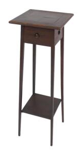 An Arts & Crafts late 19thC oak jardiniere stand