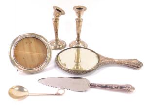 An Edward VII silver backed hand mirror