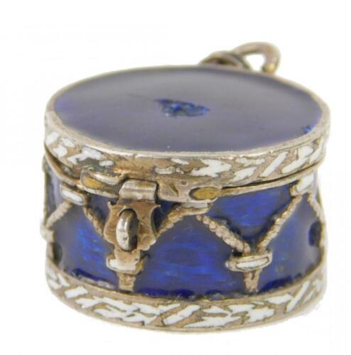 A late 19th or early 20thC silver blue and white enamel pill box charm in the form of a drum