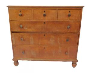 A Victorian oak chest of drawers