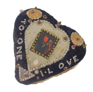 A Victorian heart shaped sweetheart's pin cushion