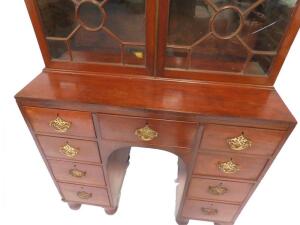 A George III mahogany bookcase on a kneehole desk base - 2