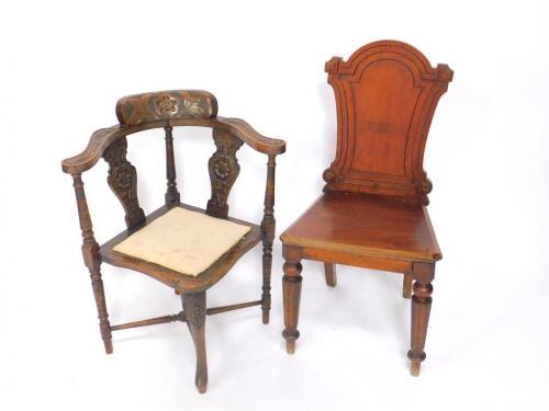 A Victorian mahogany shield back hall chair