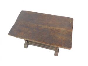 An 18thC oak low table - 2