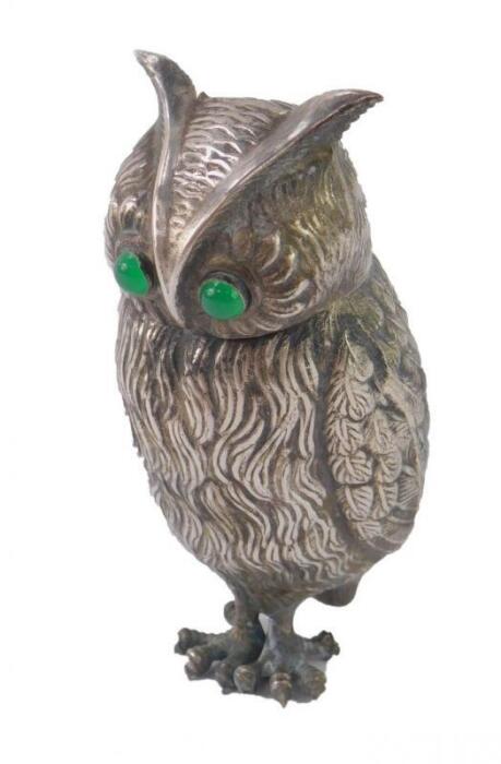 A silver plated container modelled as an owl