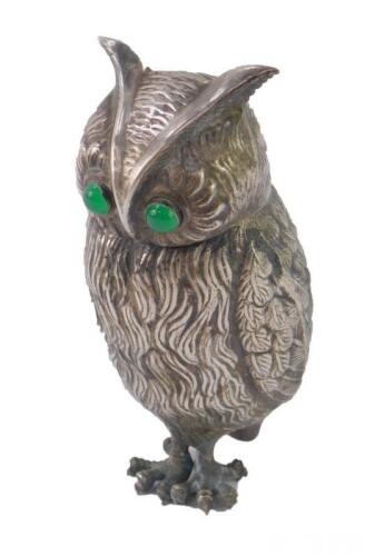 A silver plated container modelled as an owl