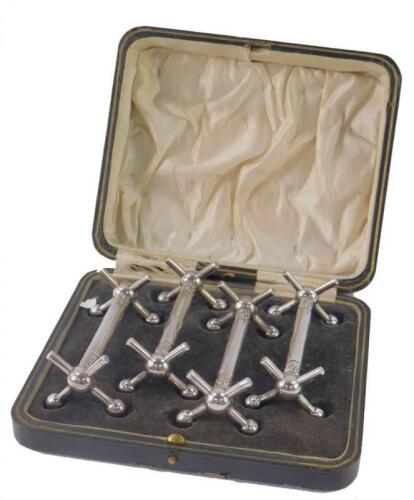 A set of four early 19thC silver plated knife rests