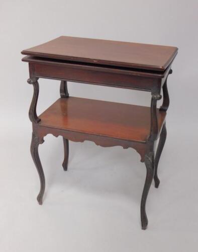 A Victorian mahogany fold over card table