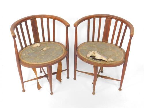 A pair of Victorian mahogany oval tub chairs