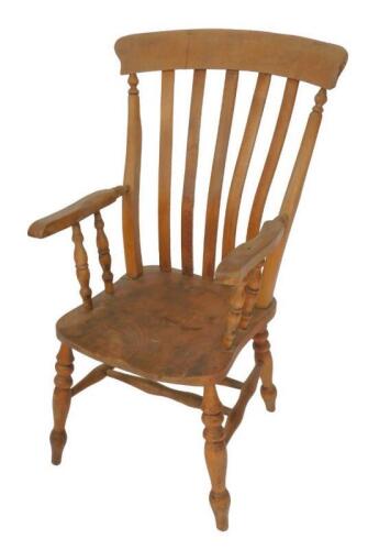 A 19thC oak and elm kitchen lath back grandfather chair