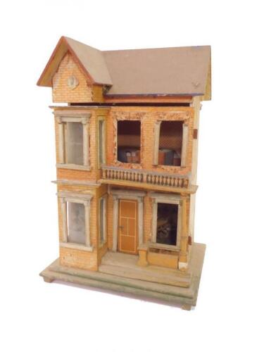 An early 20thC two storey doll's house