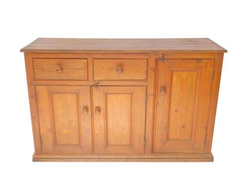 A pine kitchen cupboard