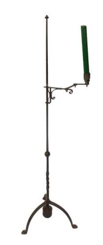A Liberty style cast iron Arts & Crafts standard candle lamp