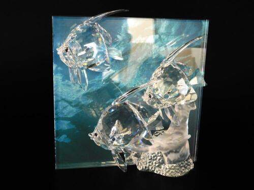 A Swarovski Crystal sculpture modelled as Community