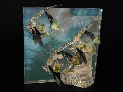 A Swarovski Crystal sculpture modelled as Community